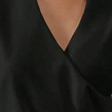 Laura - Elegantní top bez rukávů